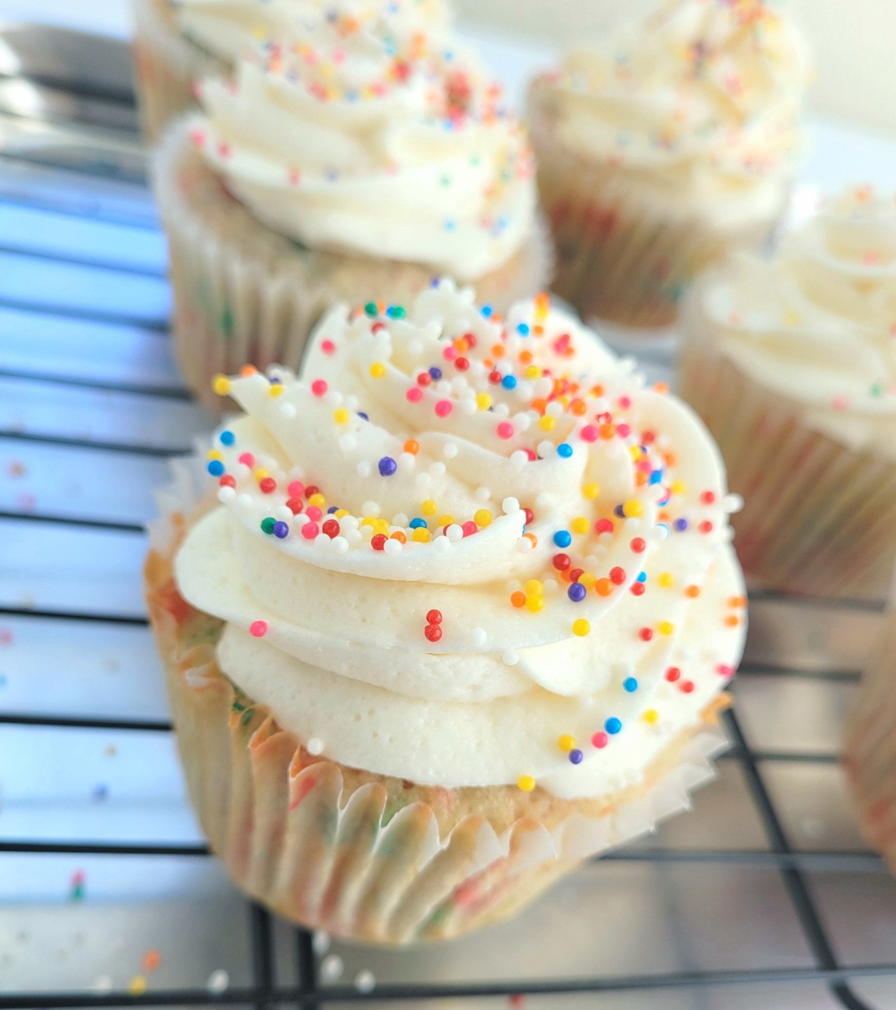 Moist Birthday Cake Cupcake with Rainbow Sprinkles - Elegant Impressions Bakery
