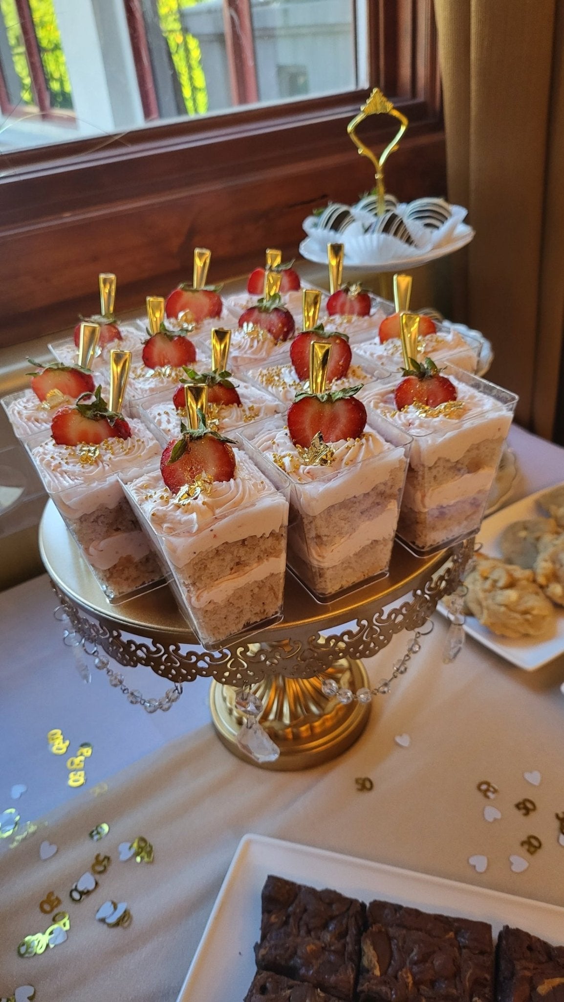 Dessert stand on a table for an Anniversary Party
